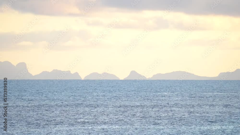 Wide Ocean Scene At Sunset With Group of Island On the Horizon Line - Static Wide Ocean Scene At Sunset With Group of Island On the Horizon Line - Static