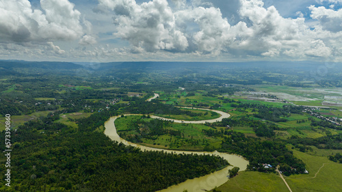 Houses of farmers among farmland and agricultural land. Negros, Philippines