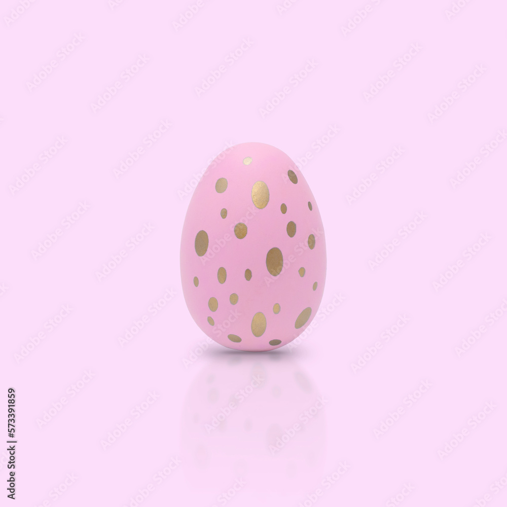 Happy Easter. Beautiful pink egg with different pattern on pink background.