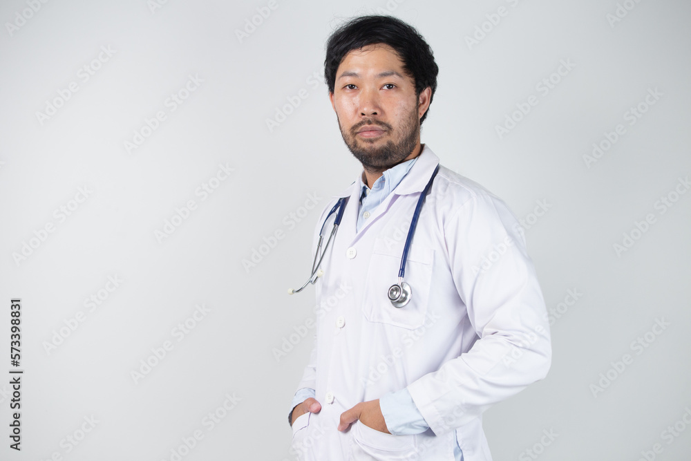 Asian man in Doctor uniform on white background in hospital Asian man in Doctor uniform on white background in hospital