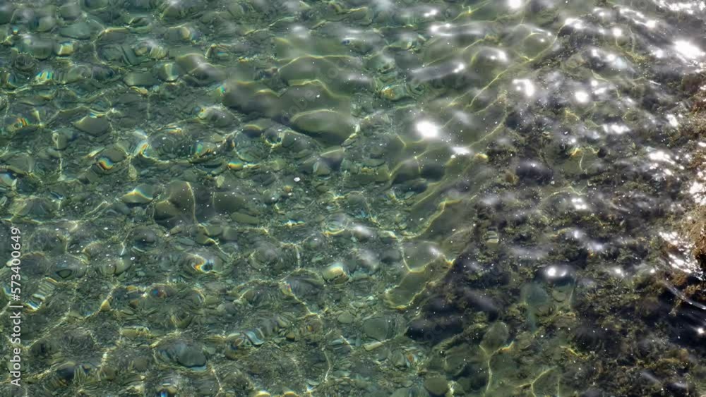 Video view of the crystal clear emerald Mediterranean sea water. Natural sea background Video view of the crystal clear emerald Mediterranean sea water. Natural sea background