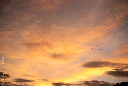 Fototapeta Naklejka Na Ścianę i Meble -  Golden sky sunrise dramatic beautiful landscape view. Dawn sky gold dusk time cloudscape with sunlight. Dramatic sunset scenic landscape. Beautiful landscape sunshine nature