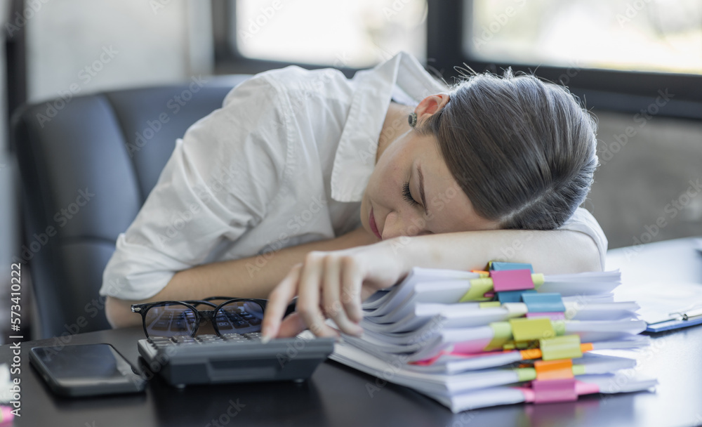 Stressed business canadian woman working from home on laptop looking worried, tired and overwhelmed. Depressed business woman Worrying Subject Mental Health Disorder Concept