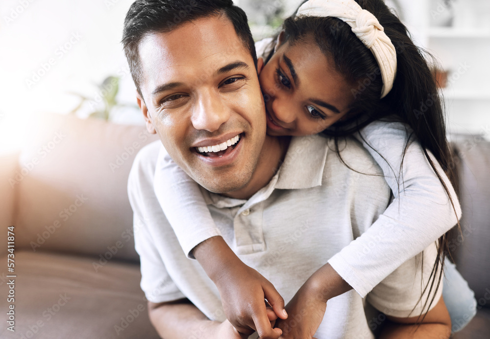 Obraz premium Family, portrait and hug by girl and father on sofa, happy and relax, playing and laughing in living room. Love, face and child embrace parent on couch, cheerful for day off, weekend or relationship