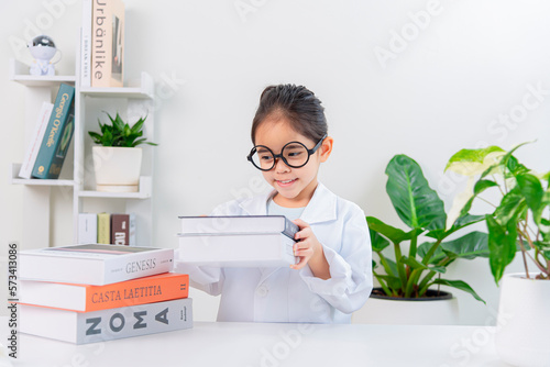 little Girl reading for research