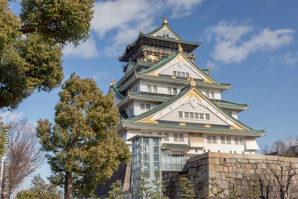 Green and white traditional Japanese architecture building of the Osaka Castle in Osaka Japan Green and white traditional Japanese architecture building of the Osaka Castle in Osaka Japan