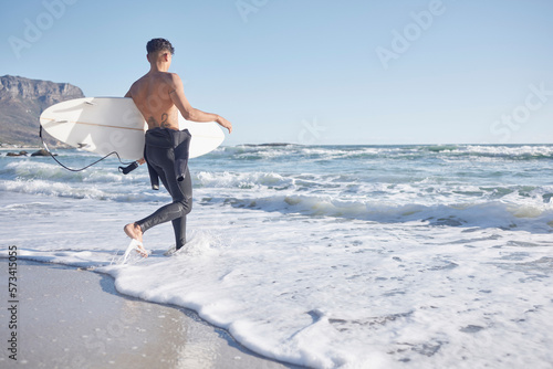 Photography Surfing, man and walking in waves, sea and ocean of summer, freedom and blue sky mockup in Cape Town