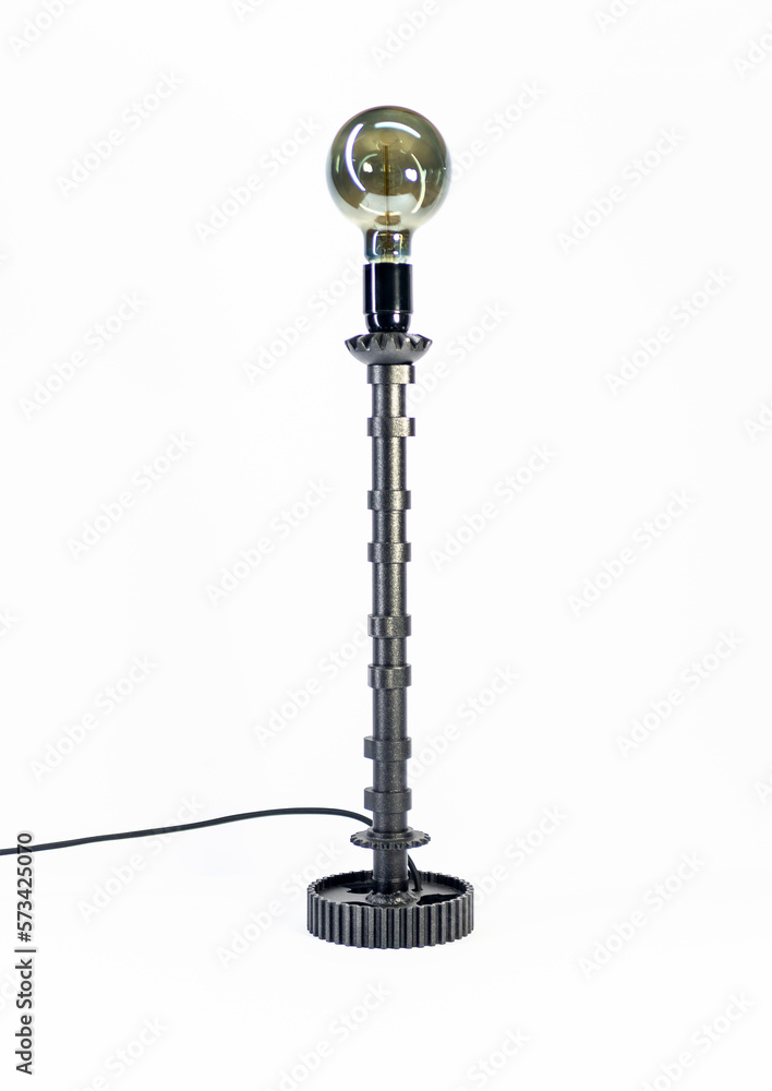 Black tall lamp with bulb on white background.
