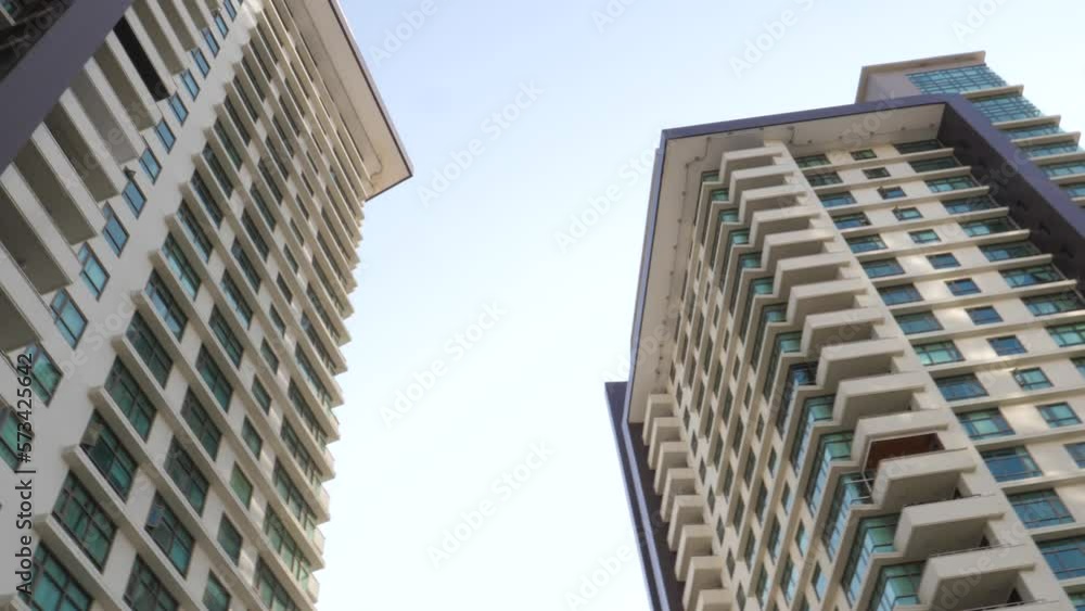 Karachi , Pakistan -: Slow Dolly rotating Reveal Looking Up At Emaar Residential Apartments Located In Crescent Bay, Karachi. Karachi , Pakistan -: Slow Dolly rotating Reveal Looking Up At Emaar Residential Apartments Located In Crescent Bay, Karachi.