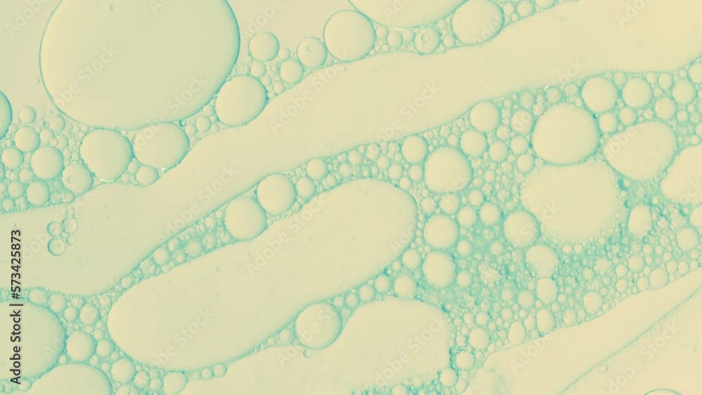 abstract oil drops background in bright liquid for cosmetic treatments Hydrogen abstract oil drops background in bright liquid for cosmetic treatments Hydrogen