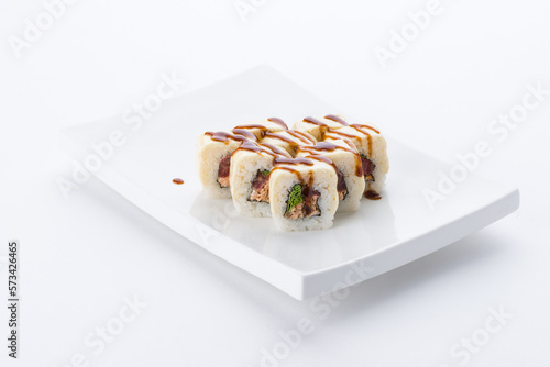 Sushi set and composition at white background. Japanese food restaurant, sushi maki gunkan roll plate or platter set.