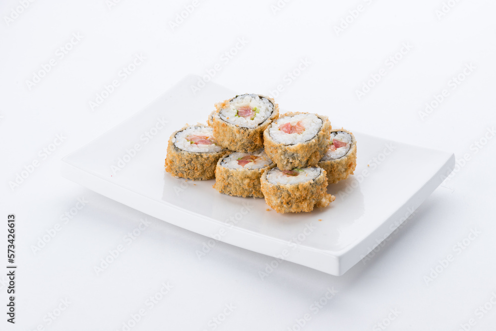 Sushi set and composition at white background. Japanese food restaurant, sushi maki gunkan roll plate or platter set.