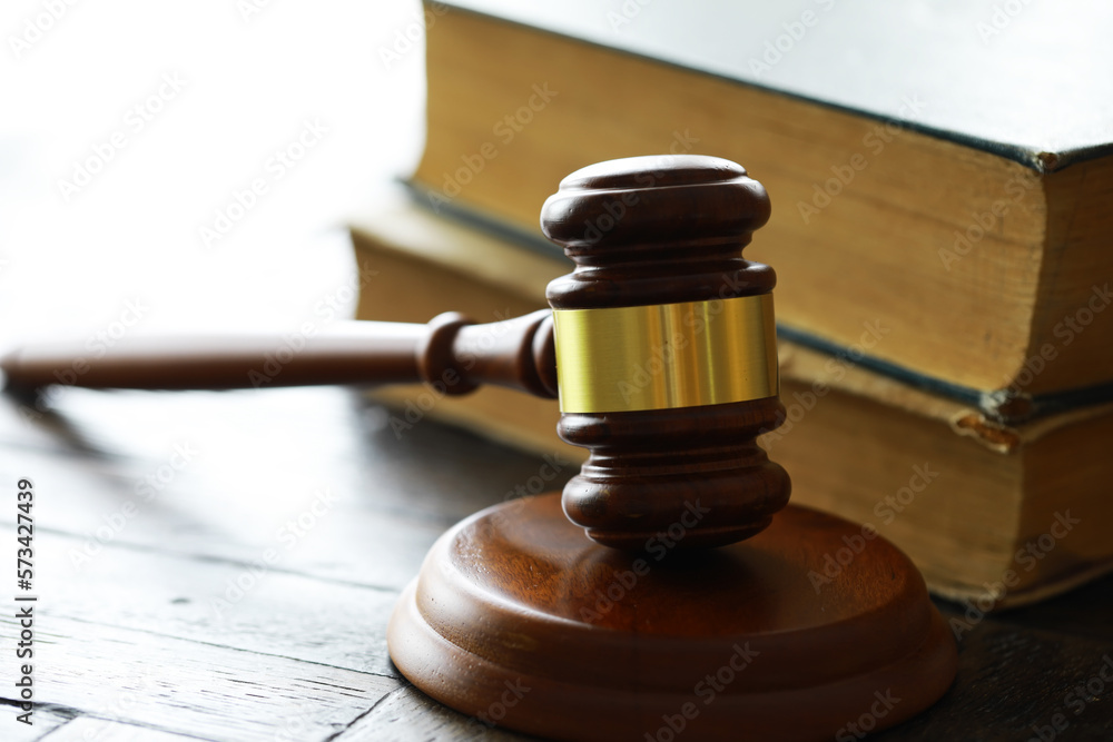 Judges gavel on wooden desk. Law firm concept. Judges gavel on wooden desk. Law firm concept.