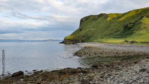 Beautiful Scottish landscape and stone beach near Staffin city and  the ruins of old diatomite factory at Isle of Skye photo