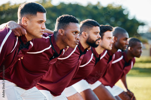 Man, huddle and team scrum for sports coordination, collaboration or serious on the grass field. Group of sport men in fitness training, planning or strategy getting ready for game, match or start