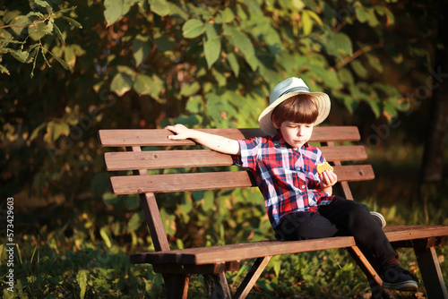 Leaf fall in the park. Children for a walk in the autumn park. Family. Fall. Happiness.