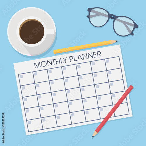 Monthly planner on the table, top view