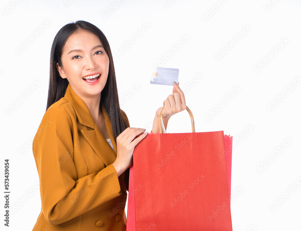 positive pretty asian woman smile holding a credit card, payment credit card for confident lifestyle concept advertising white background
positive pretty asian woman smile holding a credit card, payment credit card for confident lifestyle concept advertising white background