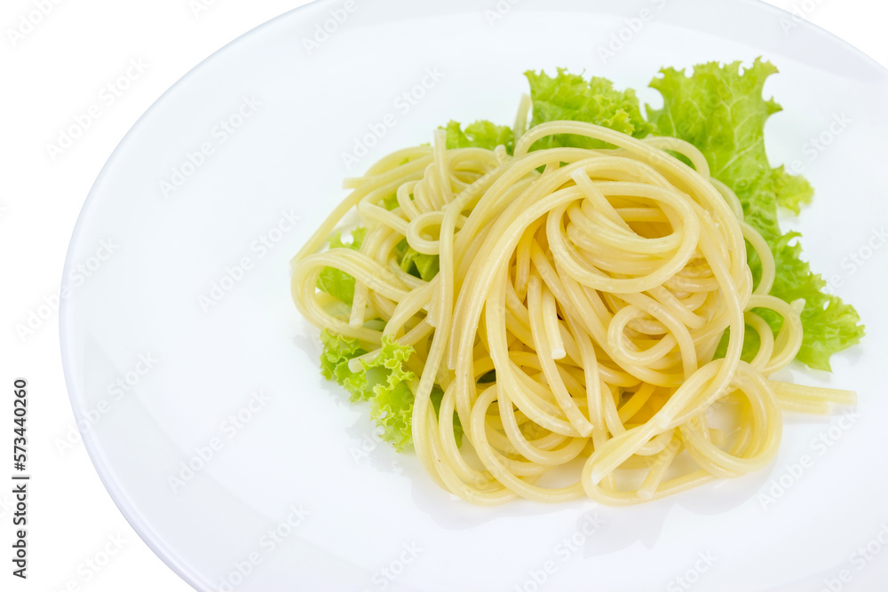 spaghetti with lettuce on white dish isolated spaghetti with lettuce on white dish isolated