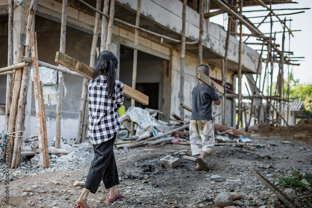 Children working at construction site for world day against child labor concept: Children working at construction site for world day against child labor concept: