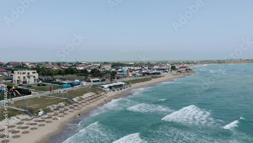 Beautiful Beach In The Scenic Town Of Vama Veche In Romania - aerial drone shot photo