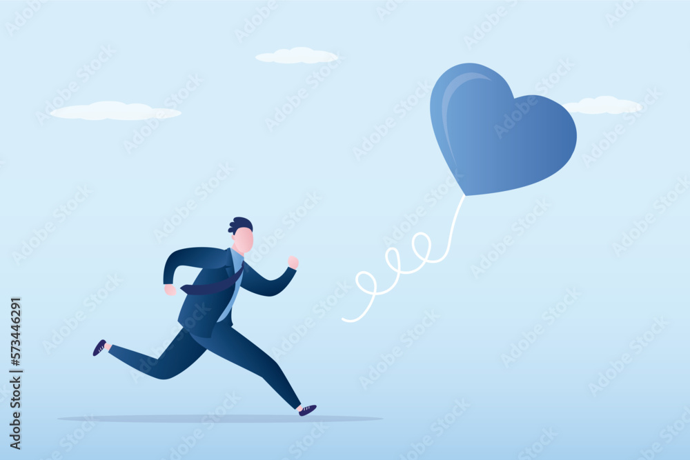 Young adult is looking for his love. Searching passionate job for happiness, ambition to find right career concept. Businessman chasing heart bubble ahead. Self motivation, chase dream. Young adult is looking for his love. Searching passionate job for happiness, ambition to find right career concept. Businessman chasing heart bubble ahead. Self motivation, chase dream.