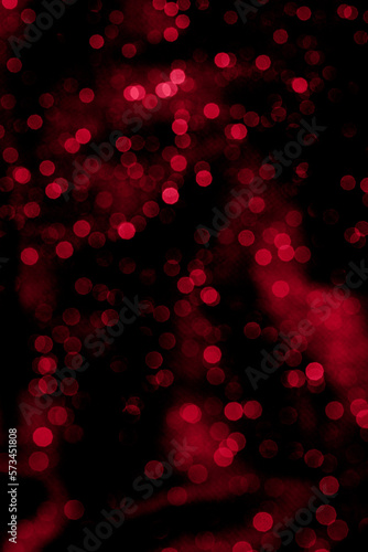 Defocused red bokeh on black background