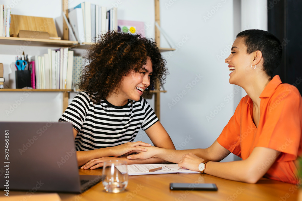 Happy business colleagues enjoying at table Happy business colleagues enjoying at table