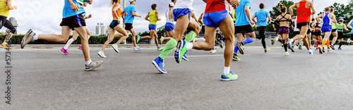 group runners men and women run marathon race in city
