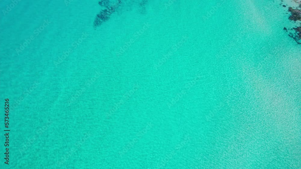Flying along the crystal clear turquoise waters of Western Australia Flying along the crystal clear turquoise waters of Western Australia