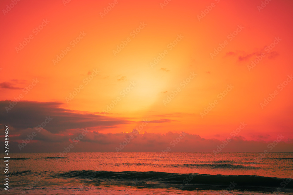 Seascape in early morning, orange sunrise over the sea. Nature landscape