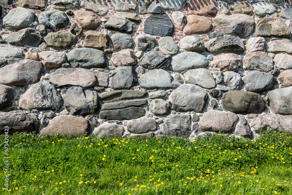 Ancient masonry of the fortress wall of the Solovetsky Monastery of huge stones. Russia