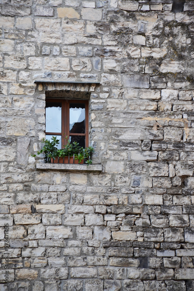 Italian window in an old stone house Italian window in an old stone house