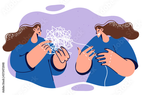Laughing woman near psychotherapist holding bundle tangled threads symbolizing unresolved problems