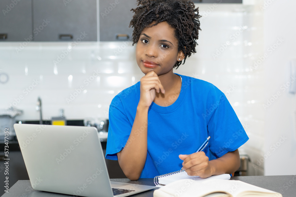 Portrait of learning african american female student at computer Portrait of learning african american female student at computer