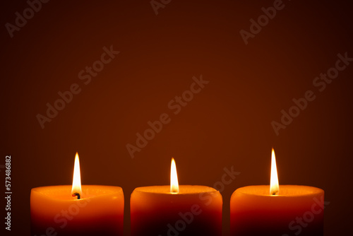 Burning candles in the dark