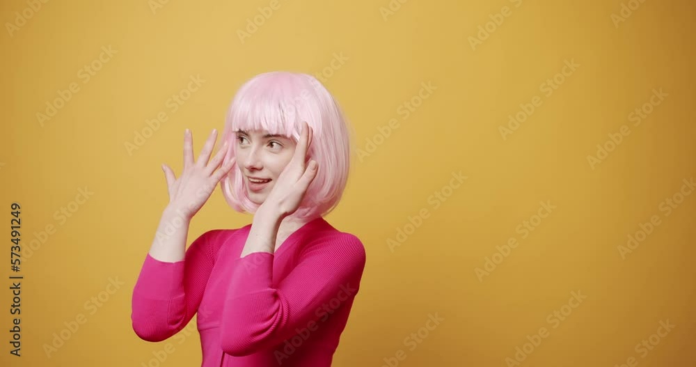 Confused woman looking through parts, she doesn't know what to do. confused. having no idea. indoor studio shot yellow background. gesturing i don't know. Confused woman looking through parts, she doesn't know what to do. confused. having no idea. indoor studio shot yellow background. gesturing i don't know.