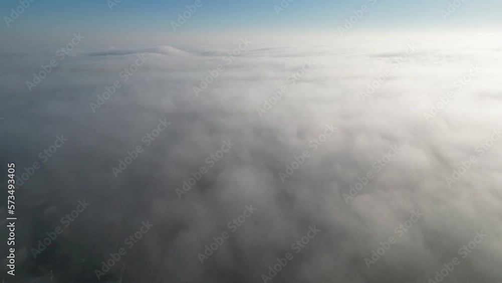 Fast moving rolling fog over a housing estate. Fast moving rolling fog over a housing estate.