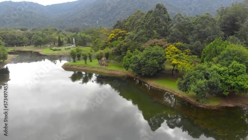 Aerial view of Taiping lake nearby greenery - moving upwards  photo