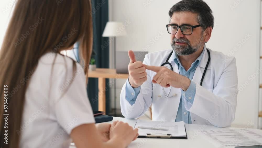 Customer is talking with professional doctor in the clinic. Customer is talking with professional doctor in the clinic.