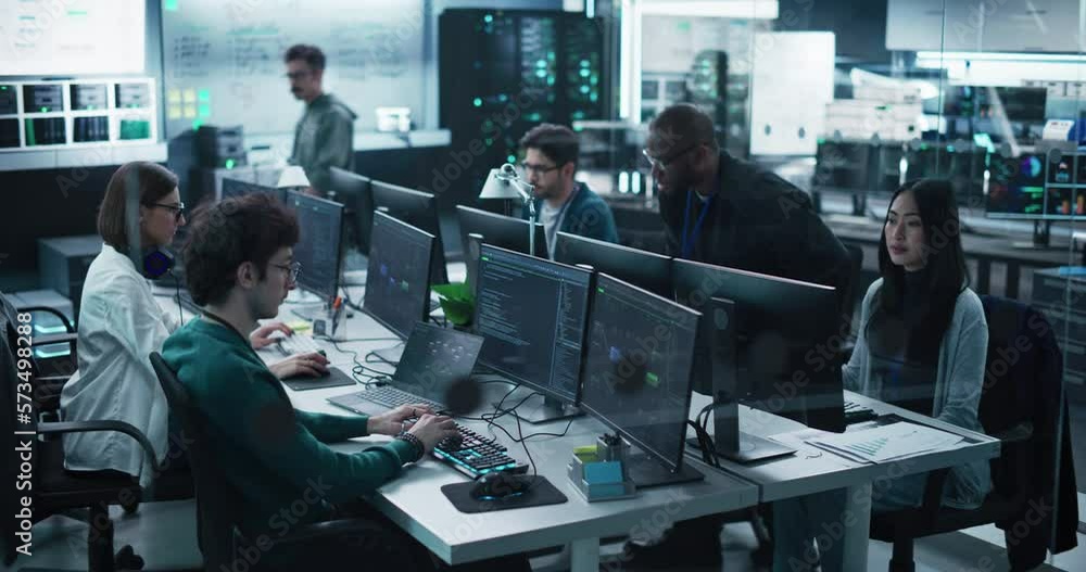 Group of Empowered Multicultural Men and Women Working in a Research Center, Using Computers to Run Advanced Software, Develop Artificial Intelligence Interface and Cloud Computing Blockchain Group of Empowered Multicultural Men and Women Working in a Research Center, Using Computers to Run Advanced Software, Develop Artificial Intelligence Interface and Cloud Computing Blockchain