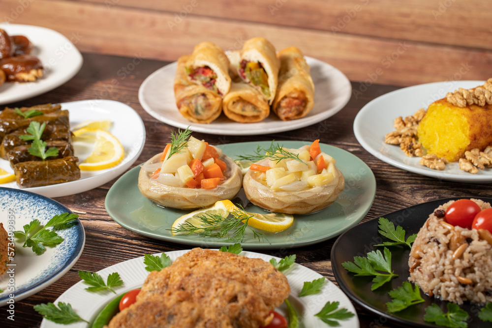 Ramadan table. Turkish food on wooden background. Iftar and sahur delicacies. Turkish oriental dishes. Types of appetizers. close up Ramadan table. Turkish food on wooden background. Iftar and sahur delicacies. Turkish oriental dishes. Types of appetizers. close up
