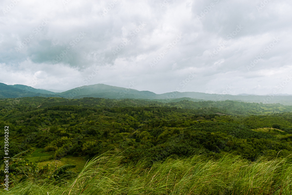 Fototapeta premium Gloomy clouds over the tropical mountains. Bulacan, Philippines