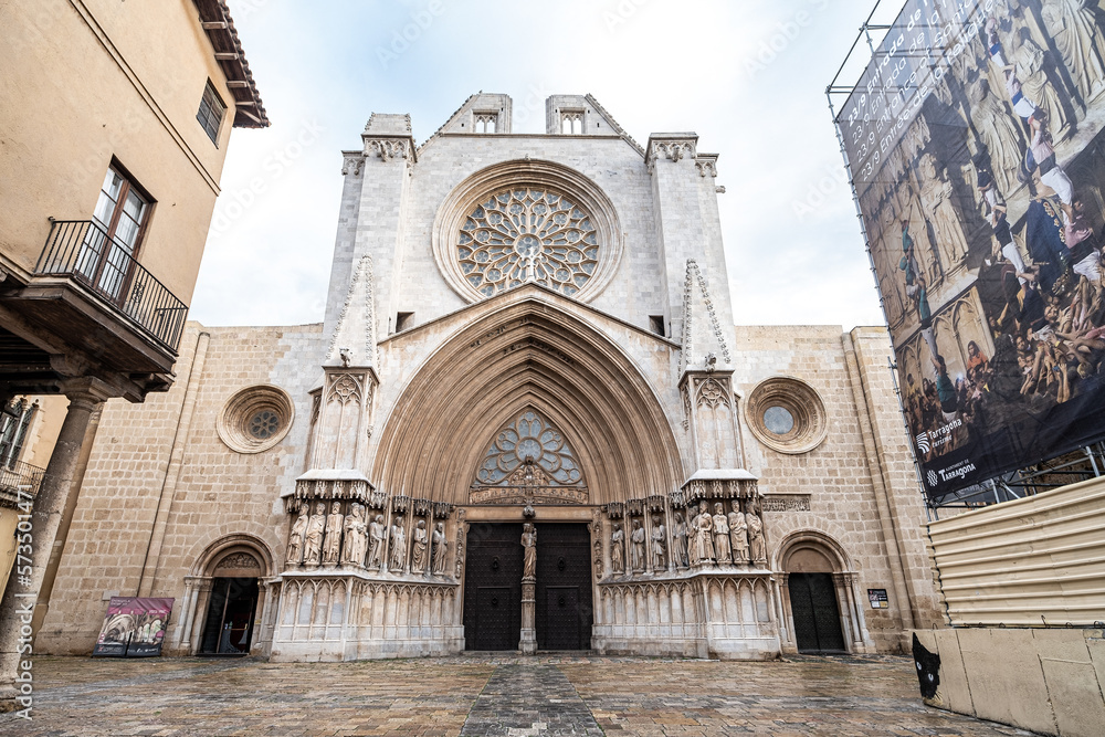 Tarragona - Catalonia, SPAIN - December 29th of 2022: Main facade of the gothic and romanesque Santa Tecla Cathedral