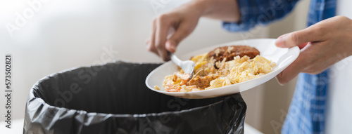 people put bio trash from food waste in domestic homes to compost bins to make fertilizer to reduce global environmental pollution.