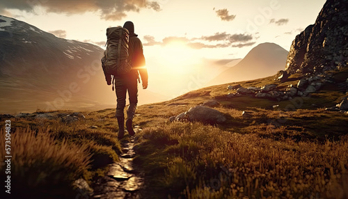 A hiker walking on a mountain meadow at sunset created using generative ai