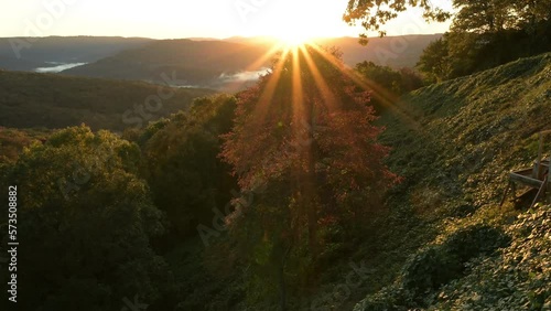 Sun rays over Ozark Mountains scenic viewpoint.  photo