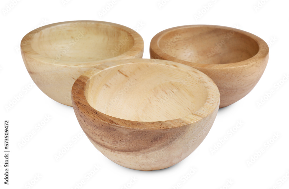 Set of wooden bowls on white background Set of wooden bowls on white background