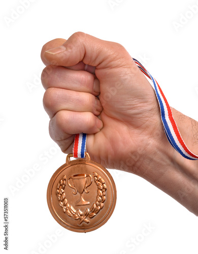 Hand hold sport medal isolated on transparent layered background.