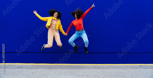 Canvas Print Young happy women dancing and having fun outdoor